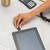USB plug connecting to a tablet