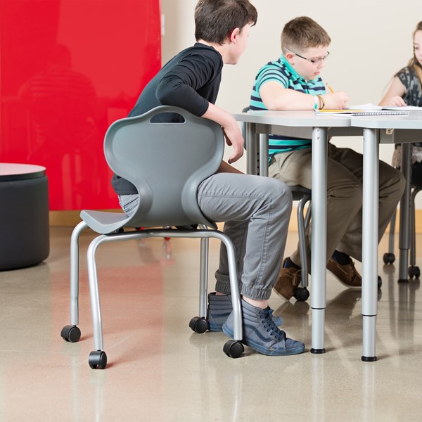Student sitting on the Mobile School Chair