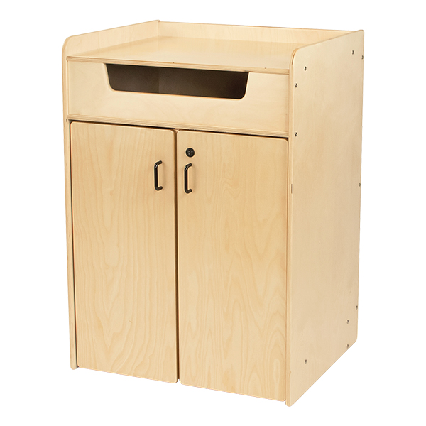 A wooden library book return bin with a slot.